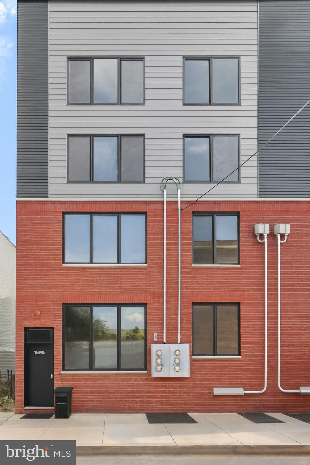 1407 North 8th Street, Unit A2 Philadelphia, PA 19122 - Photo 14 of 14 a view of a building with a window