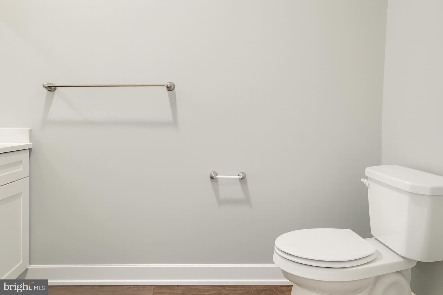 1407 North 8th Street, Unit A2 Philadelphia, PA 19122 - Photo 7 of 14 a white toilet sitting next to a bath tub