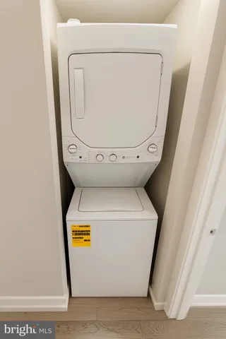 a view of a door and chair in the balcony