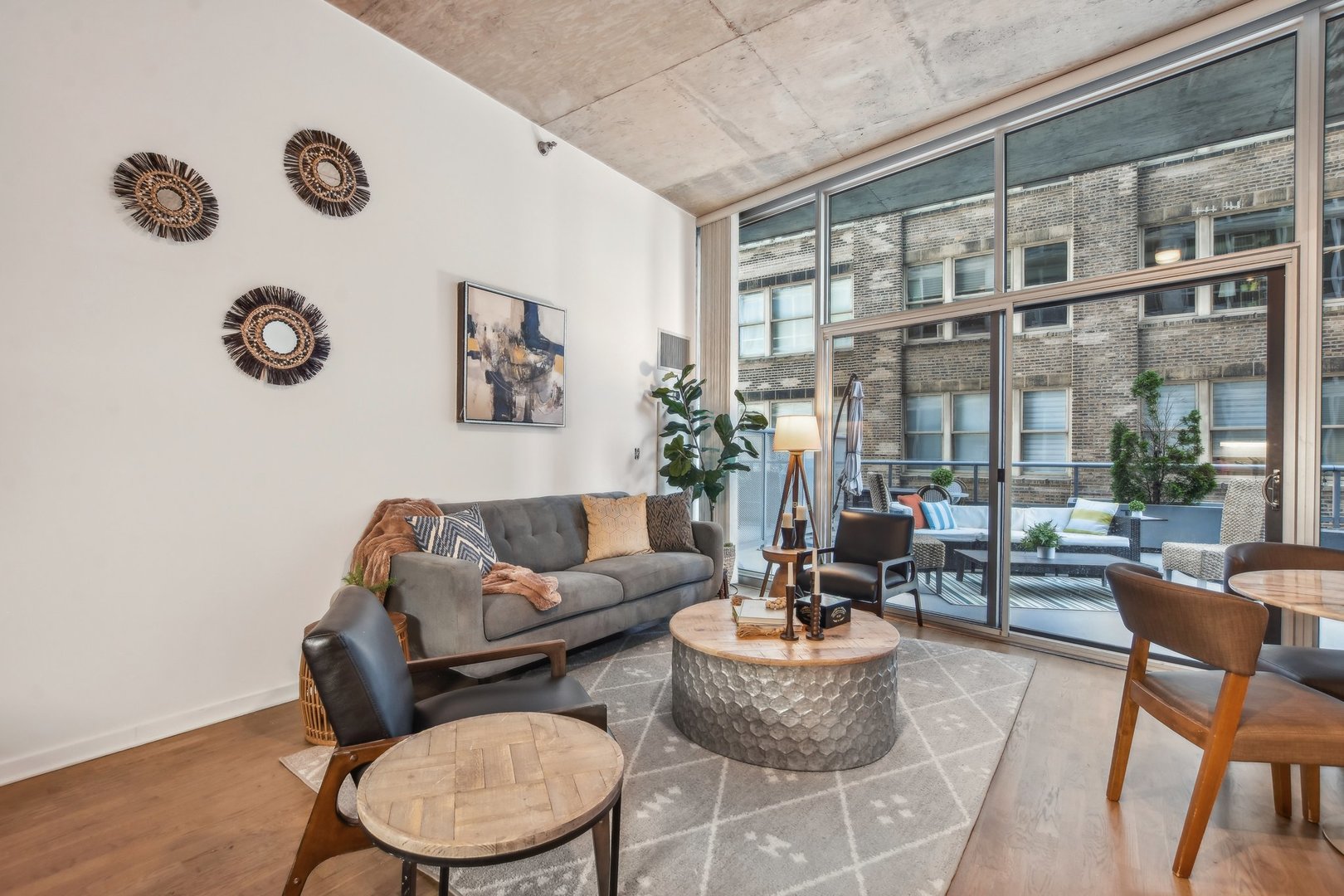 611 South Wells Street, Unit 702 Chicago, IL 60607 - Photo 2 of 32 a living room with furniture and a window