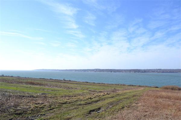 155 West Main Road Little Compton, RI 02837 - Photo 11 of 25 a view of an ocean beach and mountain