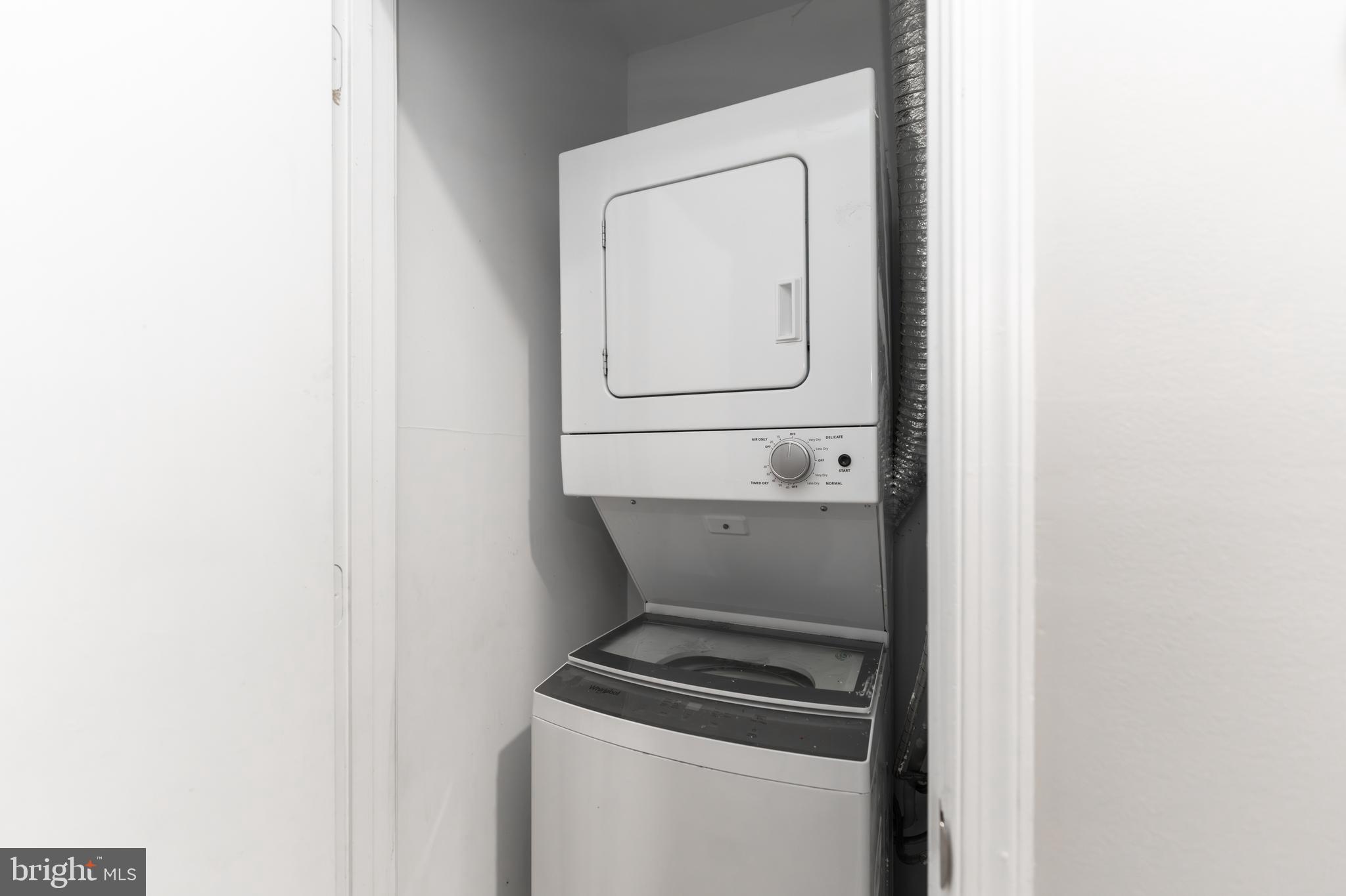 1008 Rittenhouse Street Northwest, Unit 15 Washington, DC 20011 - Photo 15 of 28 a utility room with dryer and washer
