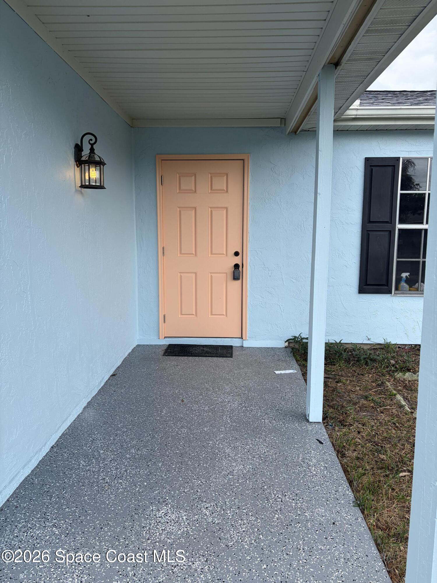 1136 Minnet Court Northeast Palm Bay, FL 32905 - Photo 1 of 31 Front Door