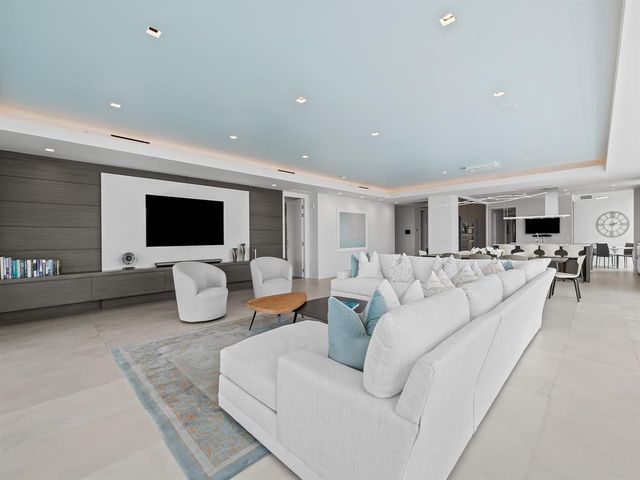 a kitchen with a sink stainless steel appliances and cabinets