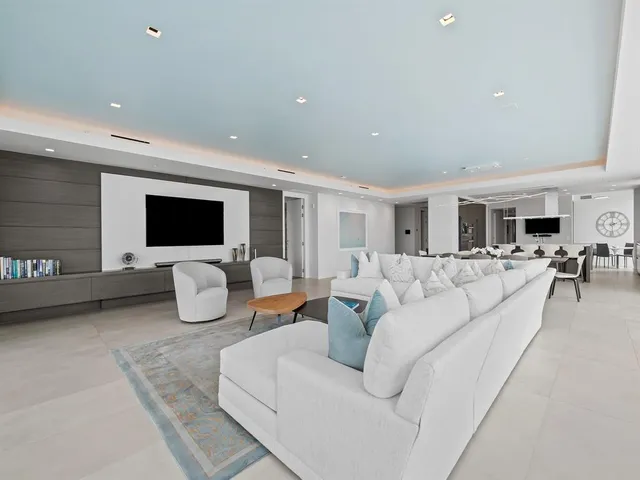 a kitchen with a sink stainless steel appliances and cabinets