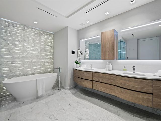 a view of an ocean with boats