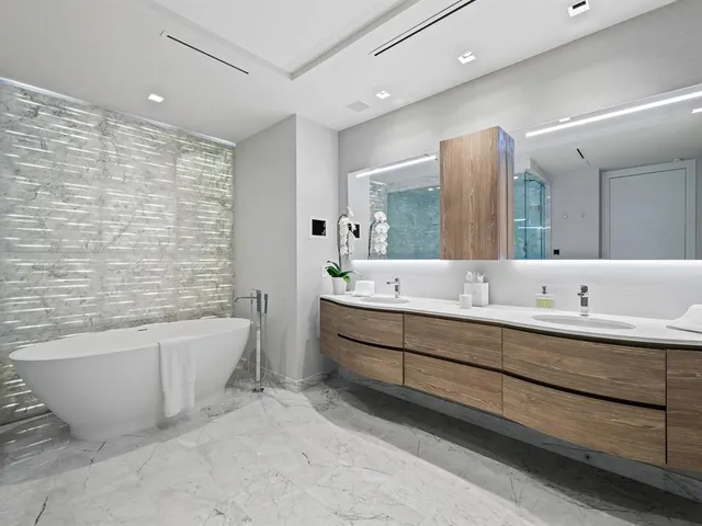 a view of an ocean with boats