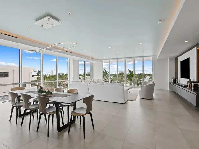 a view of a swimming pool with a lounge chair