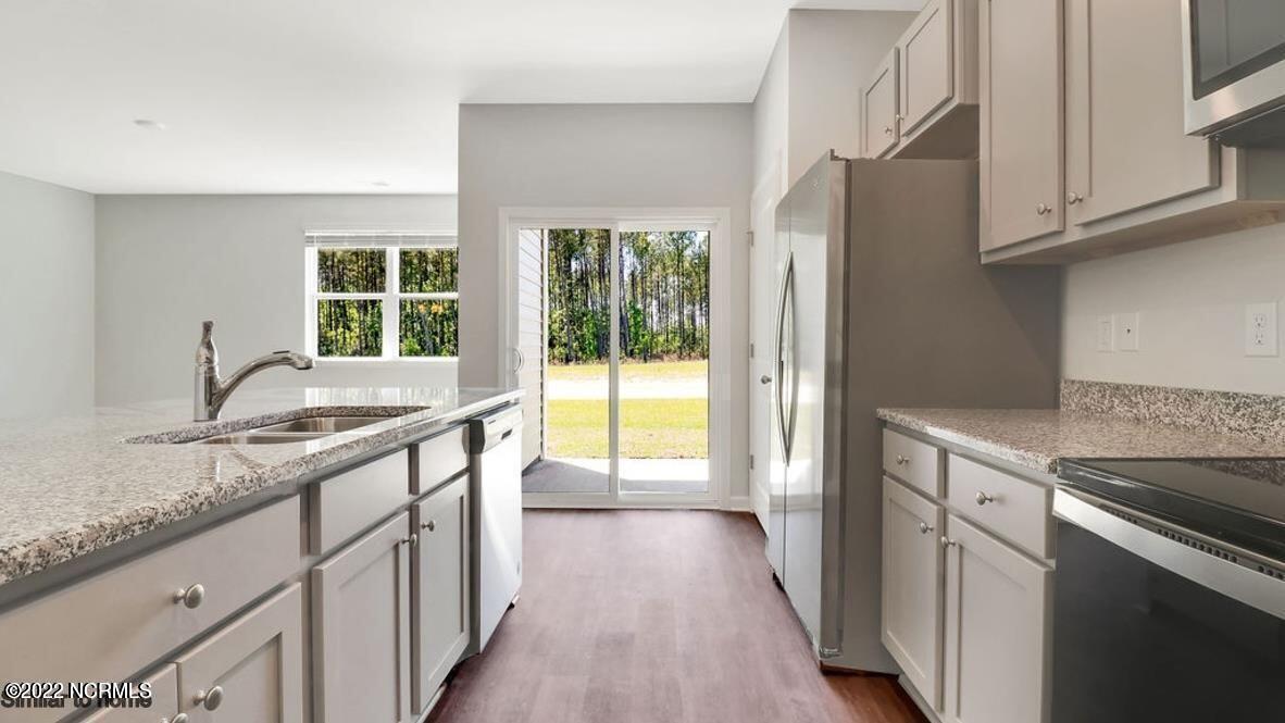 Not Actual home/colors and fixtures may vary . Refrigerator not included with appliances