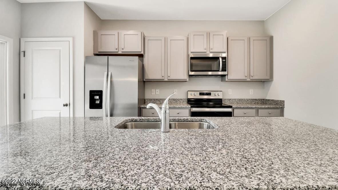 1076 Burled Oak Ridge Loop Southeast, Unit LOT 19 Bolivia, NC 28422 - Photo 8 of 33 Not Actual home/colors and fixtures may vary refrigerator not included with appliances