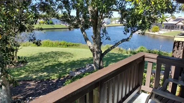 a view of swimming pool from a balcony
