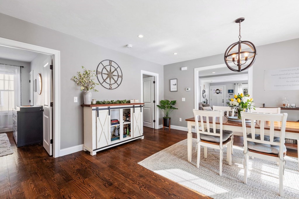 36 Eaton Road Framingham, MA 01701 - Photo 12 of 33 a view of a dining room with furniture window and wooden floor