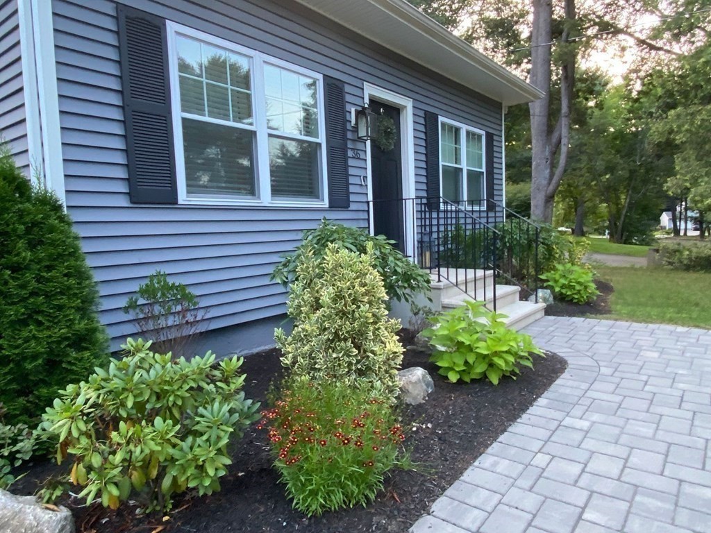 36 Eaton Road Framingham, MA 01701 - Photo 25 of 33 a front view of a house with garden