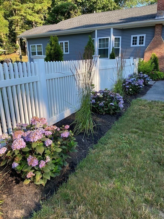 36 Eaton Road Framingham, MA 01701 - Photo 27 of 33 a front view of a house that has a garden