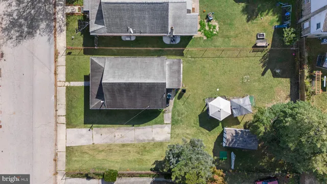 a bird view of house and yard