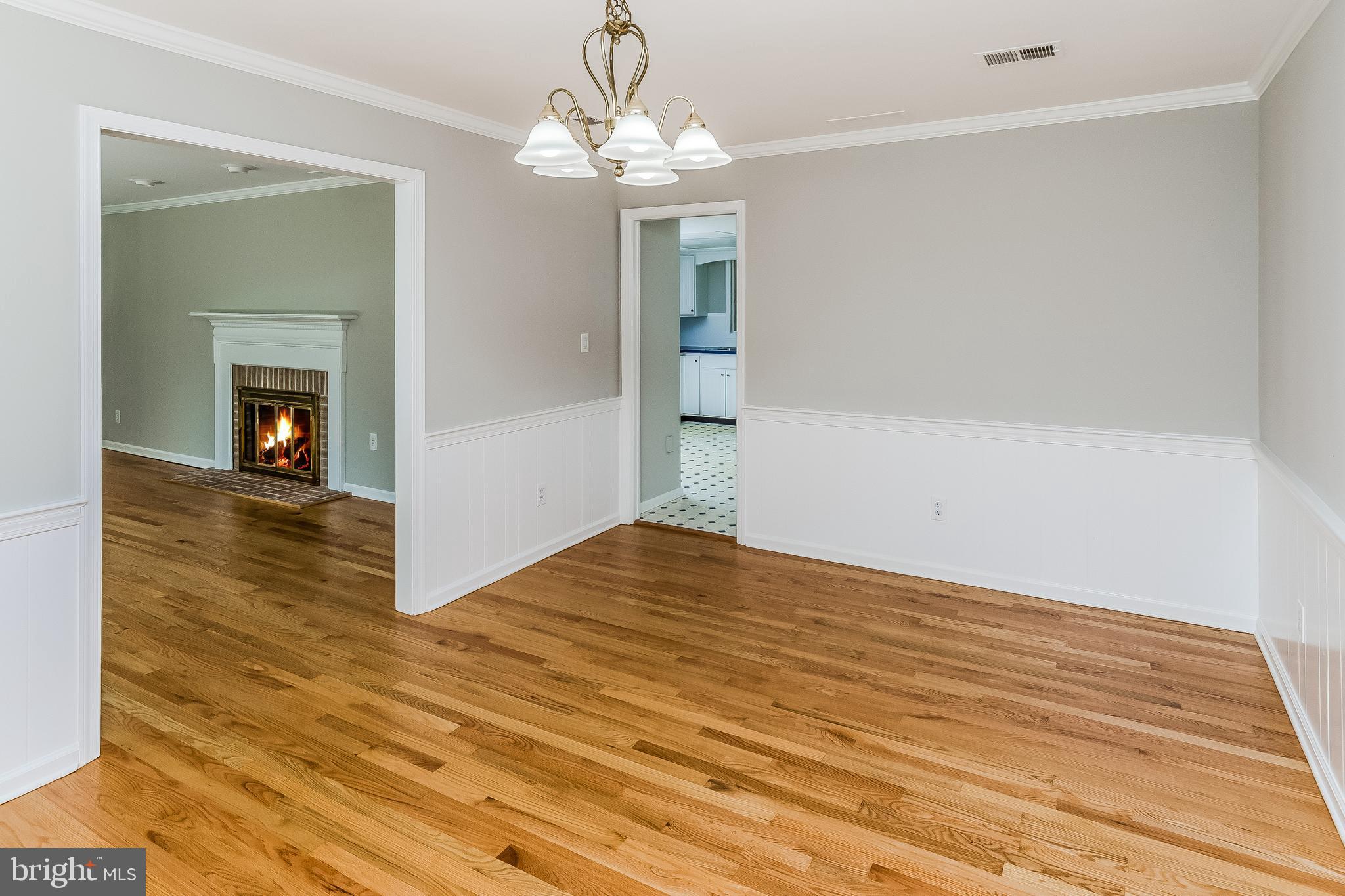 148 Lambertville Hopewell Road Hopewell, NJ 08525 - Photo 11 of 37 a view of empty room with wooden floor and fireplace