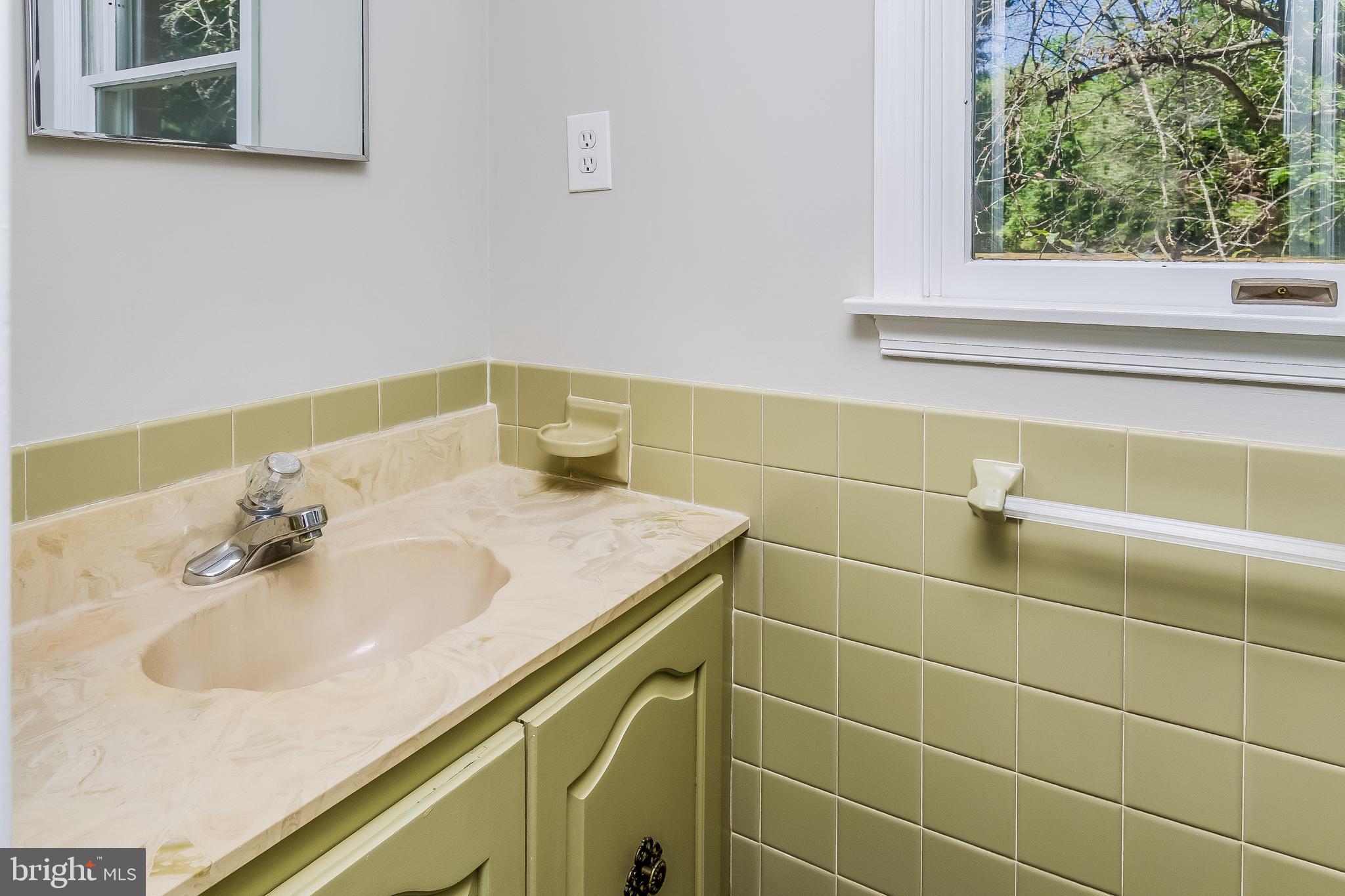 148 Lambertville Hopewell Road Hopewell, NJ 08525 - Photo 22 of 37 a bathroom with a sink and a mirror
