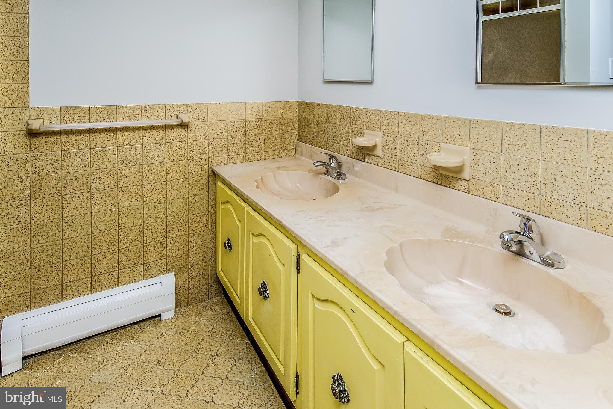 148 Lambertville Hopewell Road Hopewell, NJ 08525 - Photo 23 of 37 a bathroom with a sink and a tub