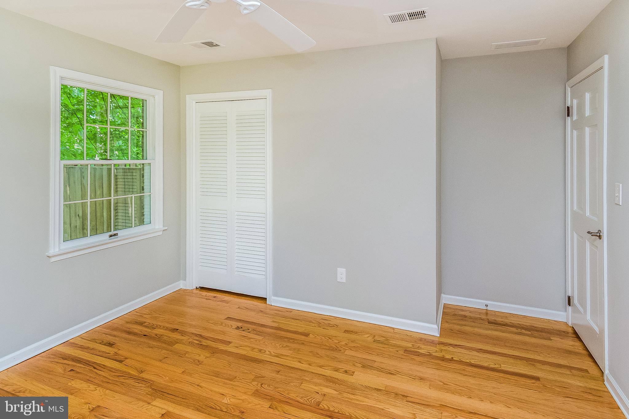 148 Lambertville Hopewell Road Hopewell, NJ 08525 - Photo 26 of 37 a view of empty room with wooden floor and fan