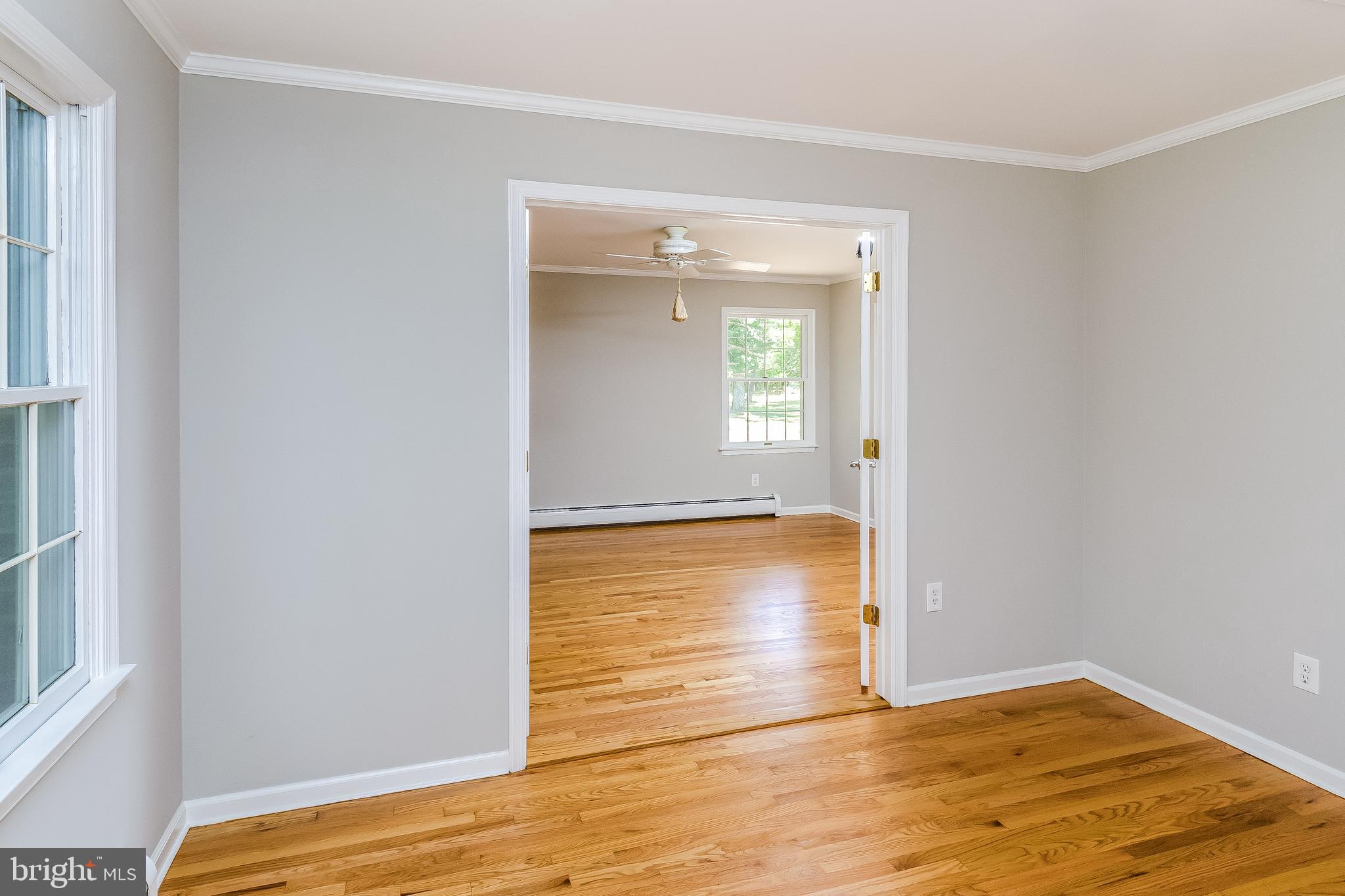 148 Lambertville Hopewell Road Hopewell, NJ 08525 - Photo 28 of 37 a view of room with window and wooden floor