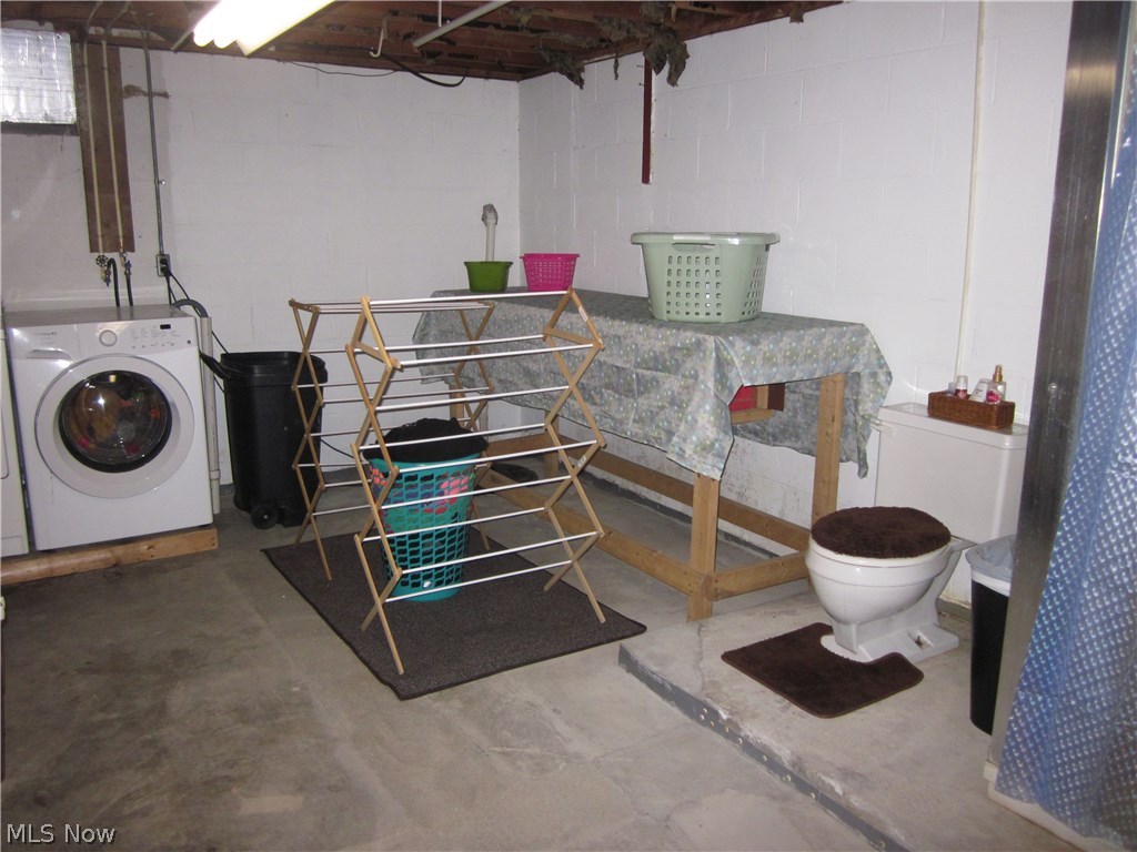 31360 Georgetown Road Salem, OH 44460 - Photo 11 of 14 Laundry room and half bath in the basement, shower is to the right