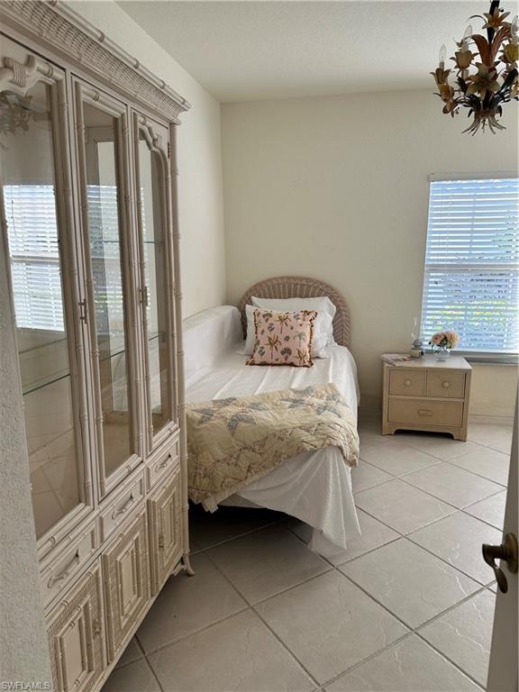 6940 Satinleaf Road North, Unit 104 Naples, FL 34109 - Photo 13 of 20 third bedroom or den