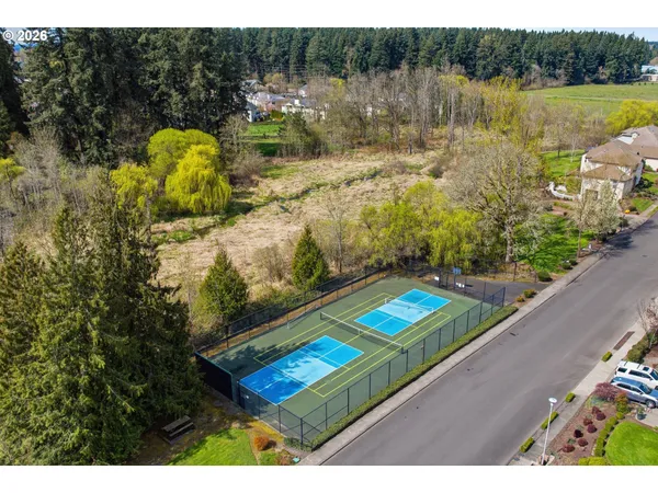 a view of a lake with a yard