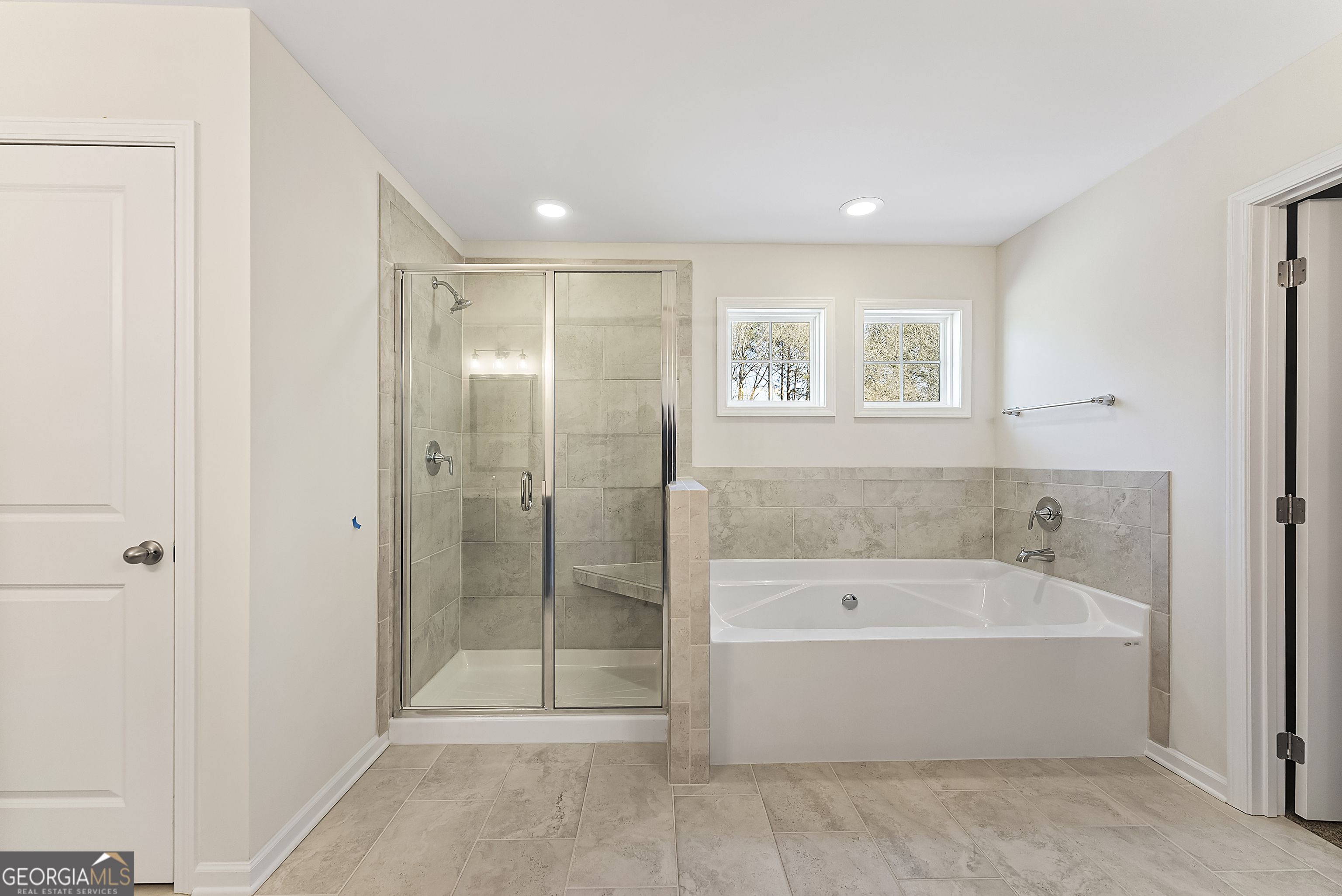 515 Bohannon Road, Unit 13 Grantville, GA 30220 - Photo 24 of 40 a spacious bathroom with a bathtub and shower