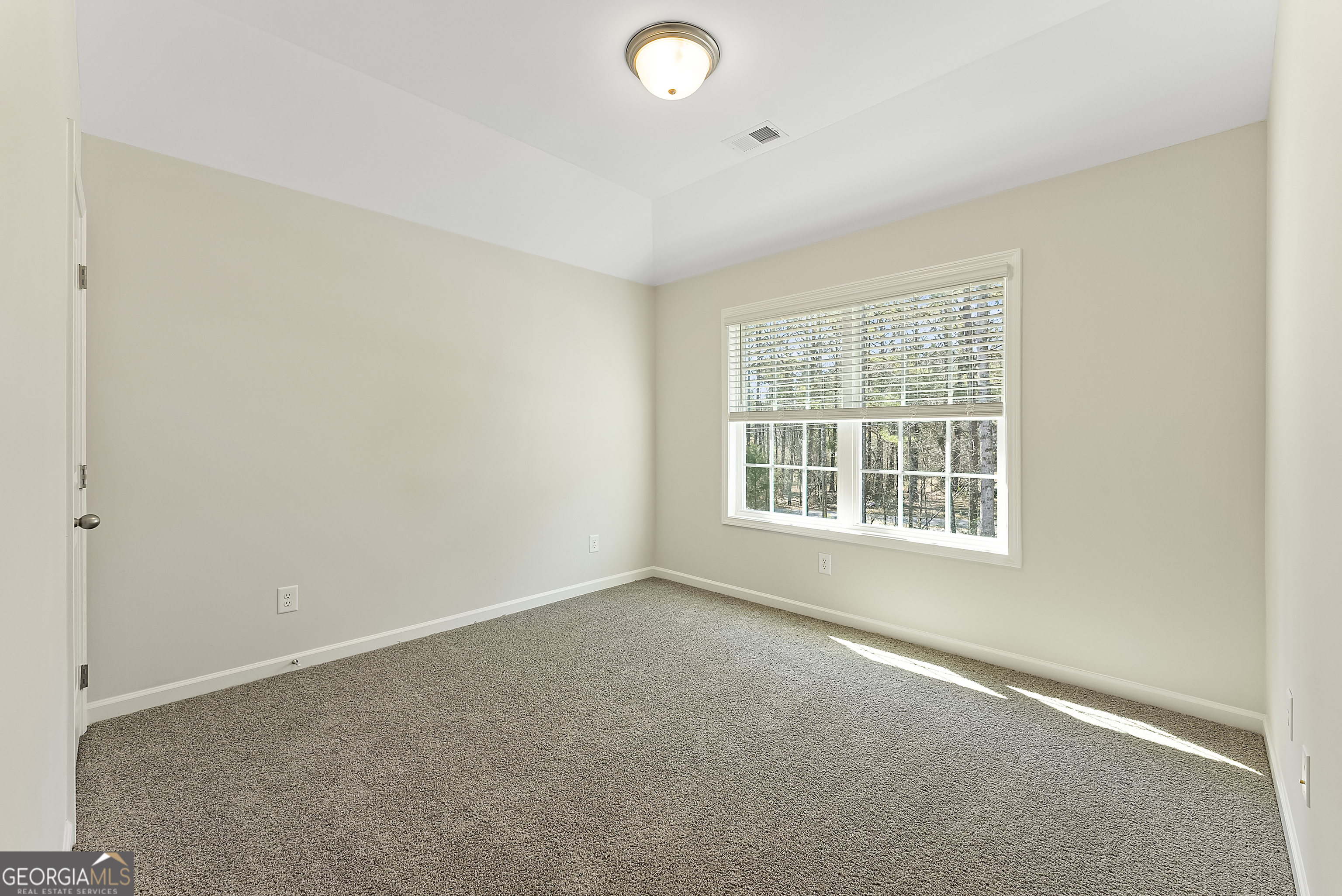 515 Bohannon Road, Unit 13 Grantville, GA 30220 - Photo 34 of 40 an empty room with a window