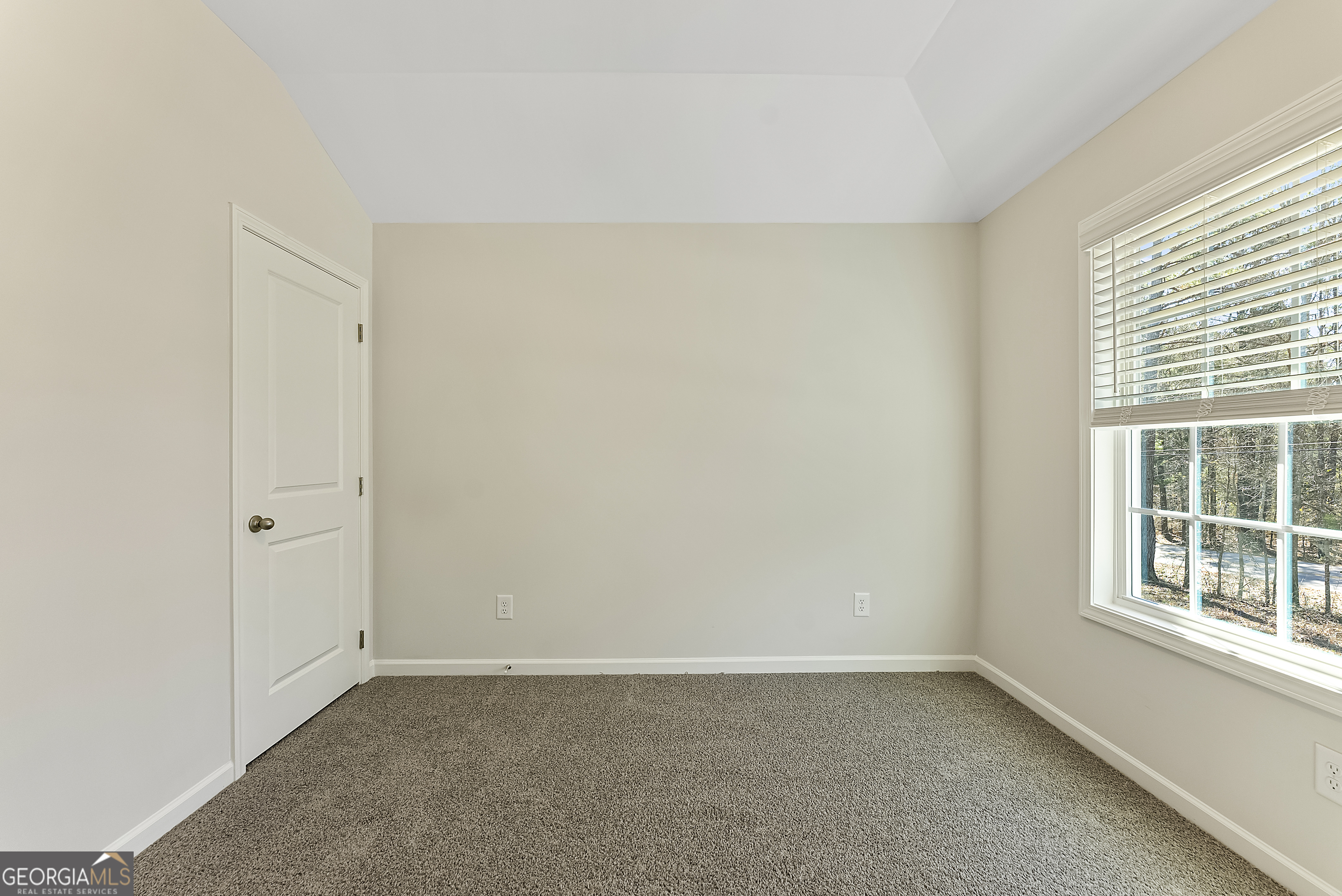 515 Bohannon Road, Unit 13 Grantville, GA 30220 - Photo 35 of 40 a view of an empty room with a window