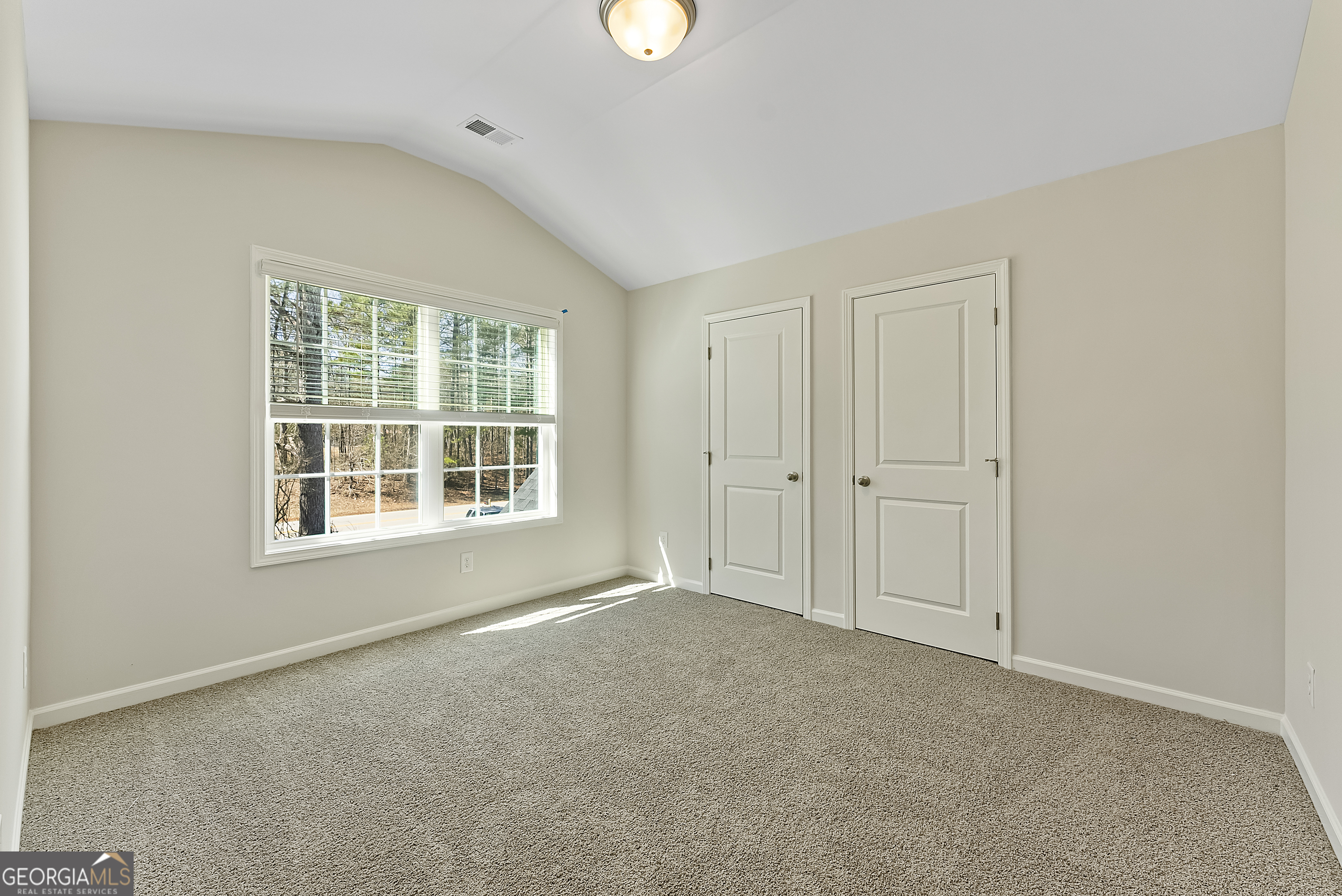 515 Bohannon Road, Unit 13 Grantville, GA 30220 - Photo 37 of 40 an empty room with windows