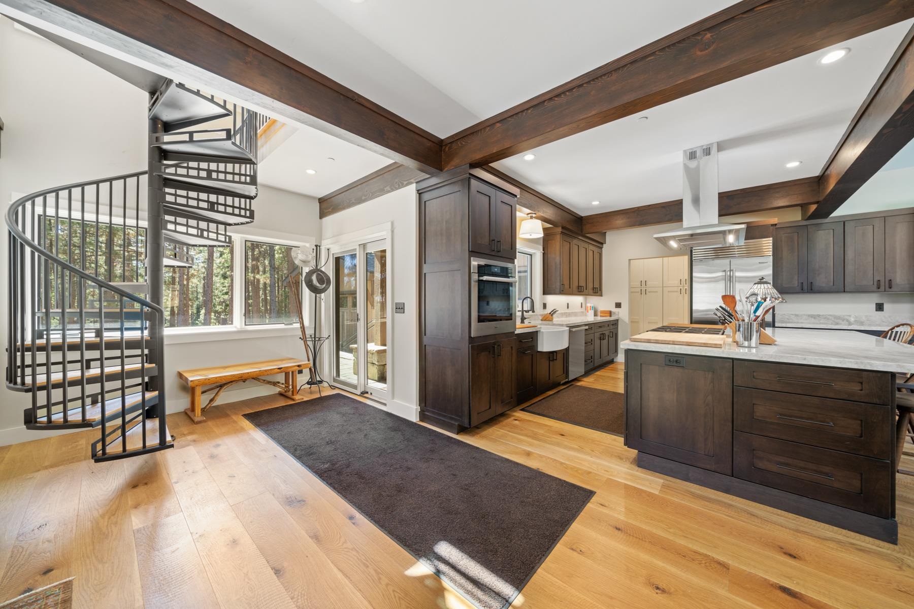 5720 Money Road Beckwourth, CA 96129 - Photo 12 of 28 a kitchen with stainless steel appliances kitchen island granite countertop a refrigerator and stove