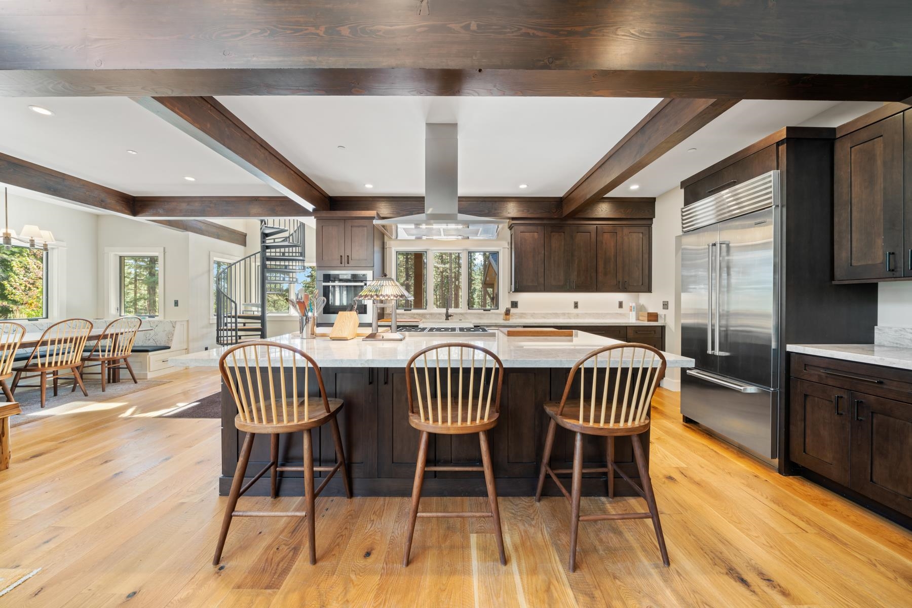 5720 Money Road Beckwourth, CA 96129 - Photo 14 of 28 a dining room with furniture a rug and wooden floor
