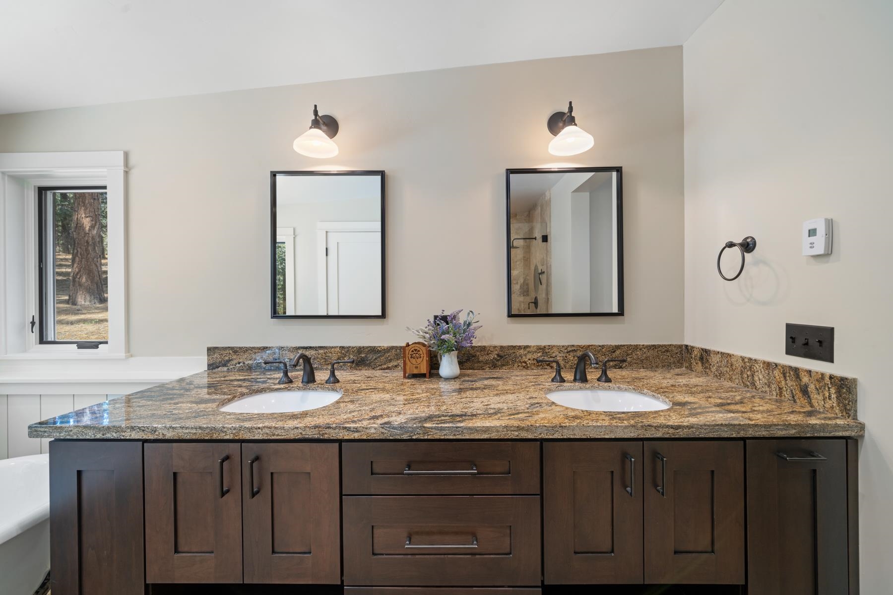 5720 Money Road Beckwourth, CA 96129 - Photo 17 of 28 a bathroom with double vanity sinks and a mirror