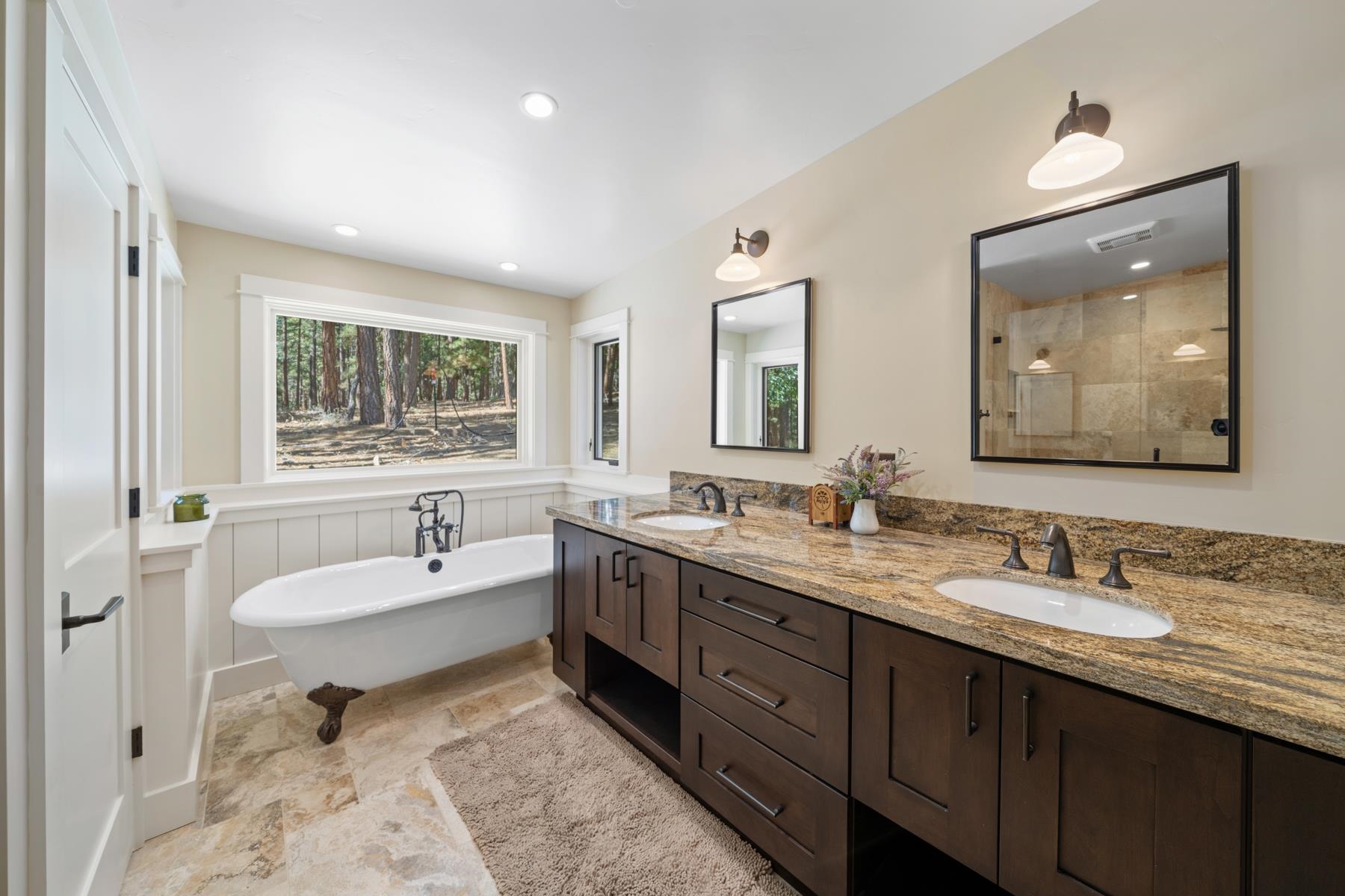 5720 Money Road Beckwourth, CA 96129 - Photo 18 of 28 a spacious bathroom with a double vanity sink large mirror and bathtub