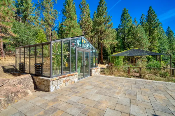 a house view with sitting space and garden view