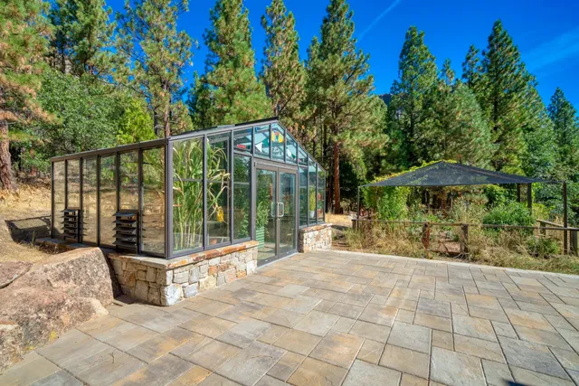 a house view with sitting space and garden view