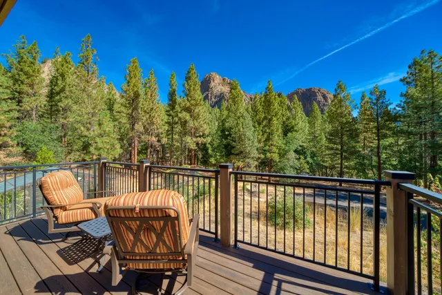 a view of a balcony with chairs