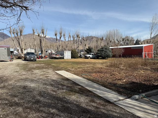 415 East Maple Street Mapleton, UT 84664 - Photo 10 of 19 View of back yard featuring a mountain view.