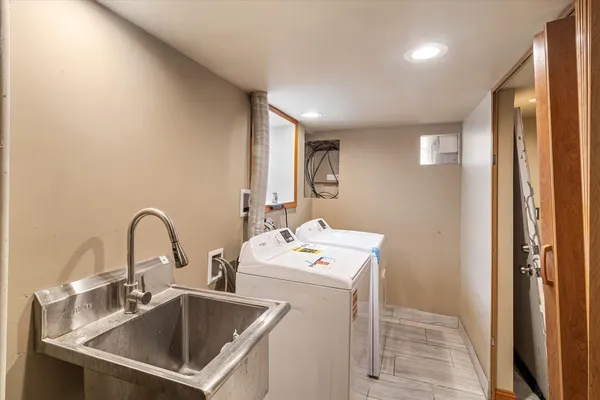 a utility room with dryer and washer