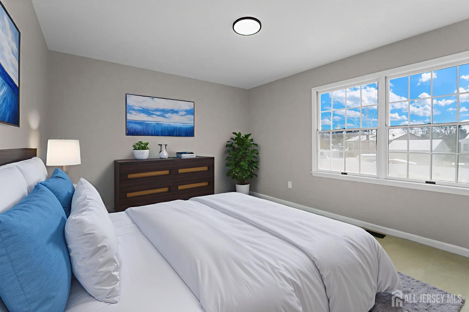 85 Wilton Avenue Middlesex, NJ 08846 - Photo 15 of 25 a bedroom with a bed and a large window