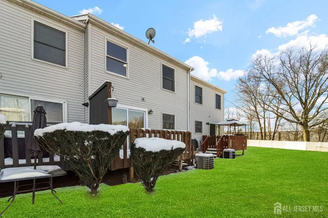 a view of a house with a yard porch and sitting area