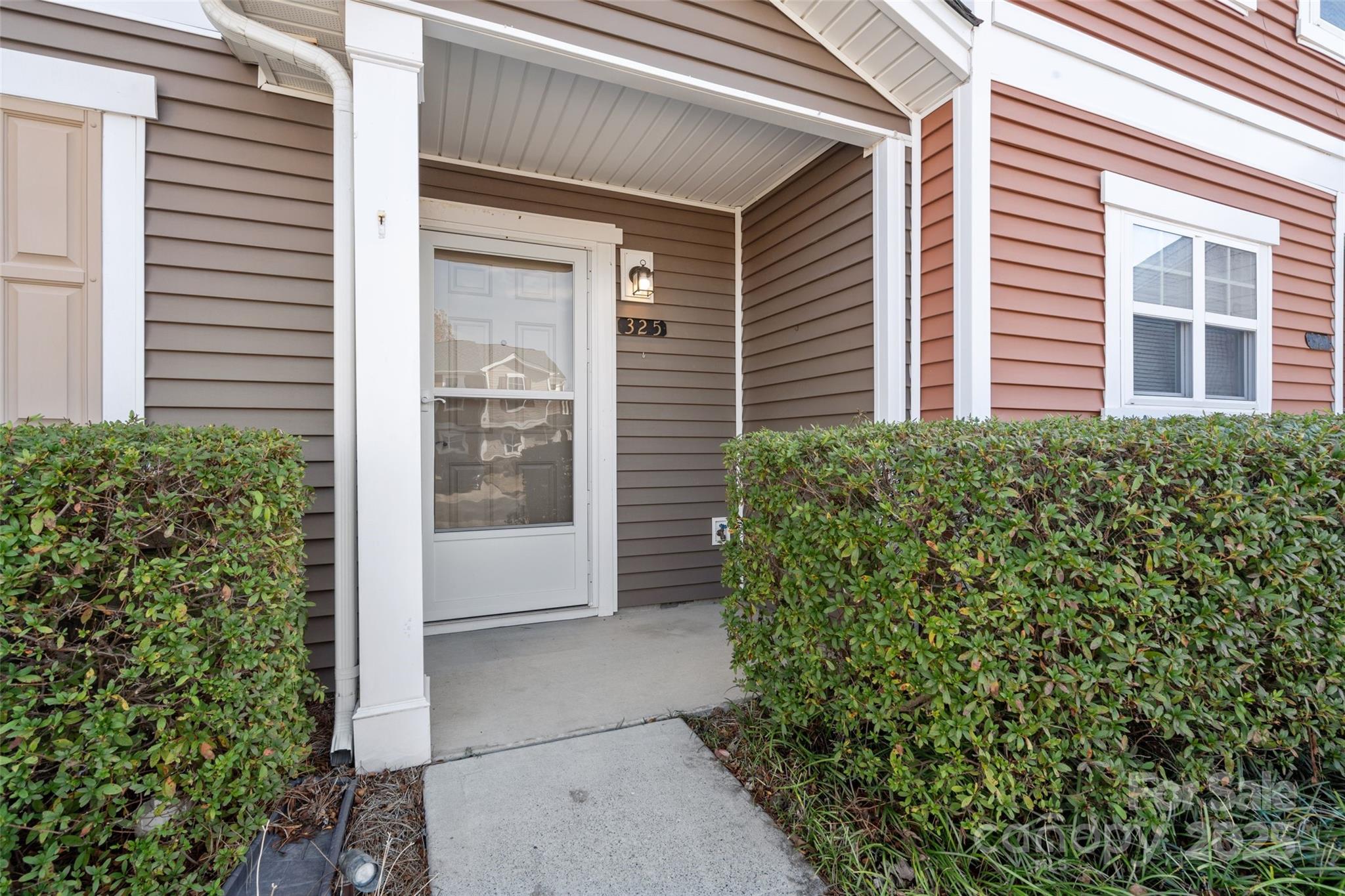 325 River Clay Road Fort Mill, SC 29708 - Photo 15 of 15 a view of a house with potted plants