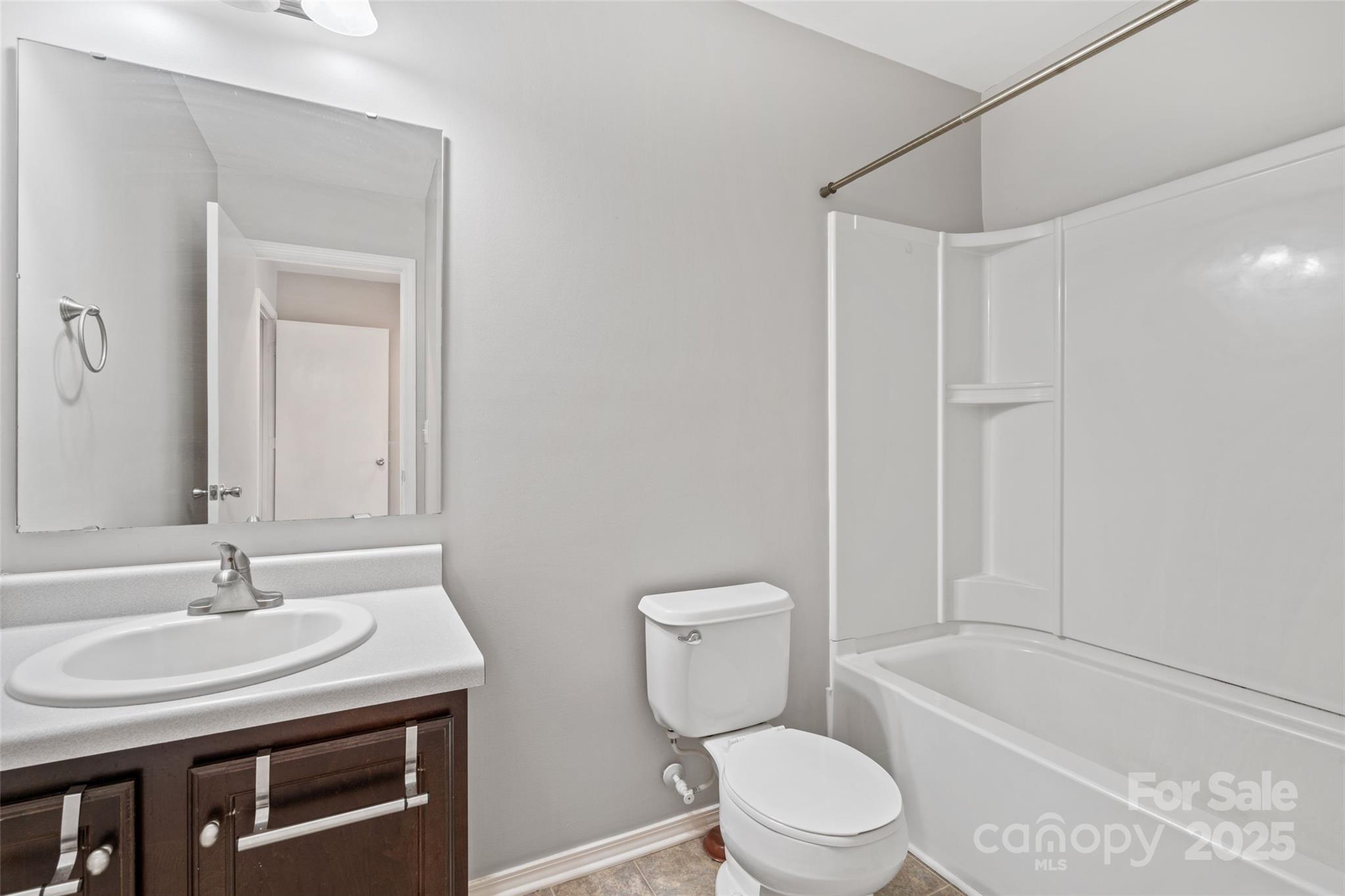 325 River Clay Road Fort Mill, SC 29708 - Photo 10 of 15 a bathroom with a sink a toilet and shower