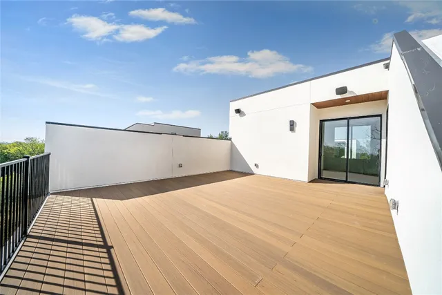 a outdoor space with patio the couches and a potted plant on a table