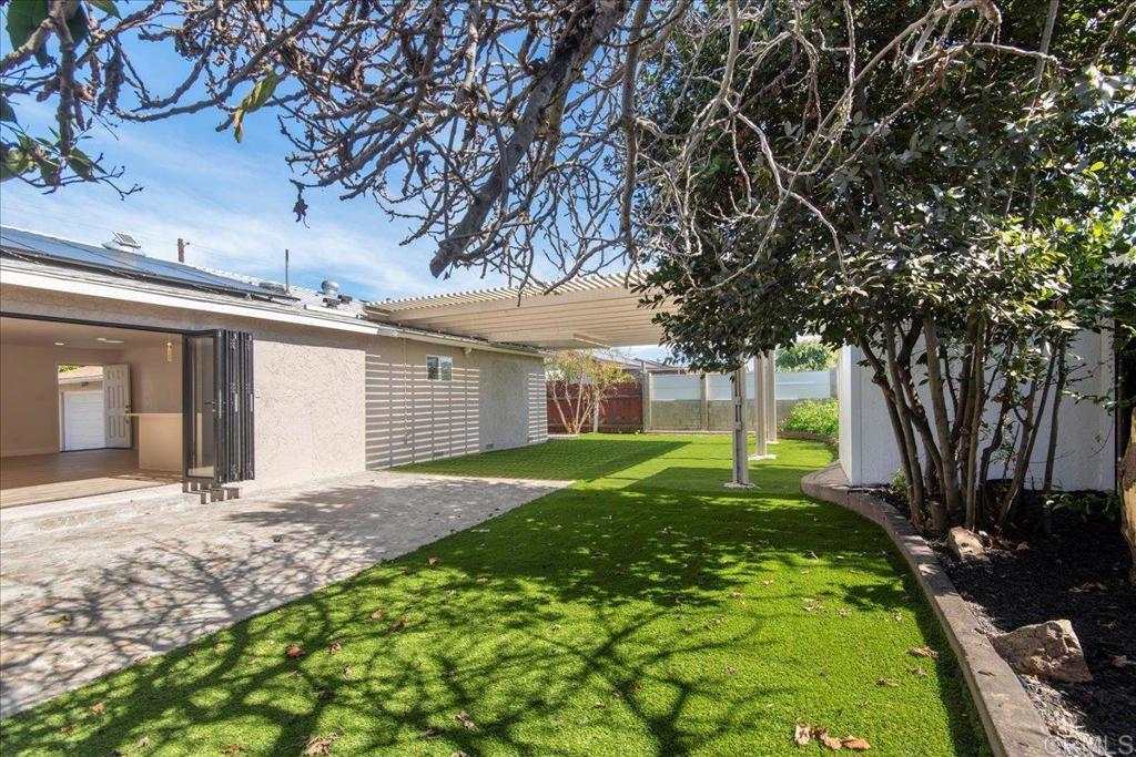 8739 St George Street Spring Valley, CA 91977 - Photo 12 of 30 a view of a house with yard and tree s