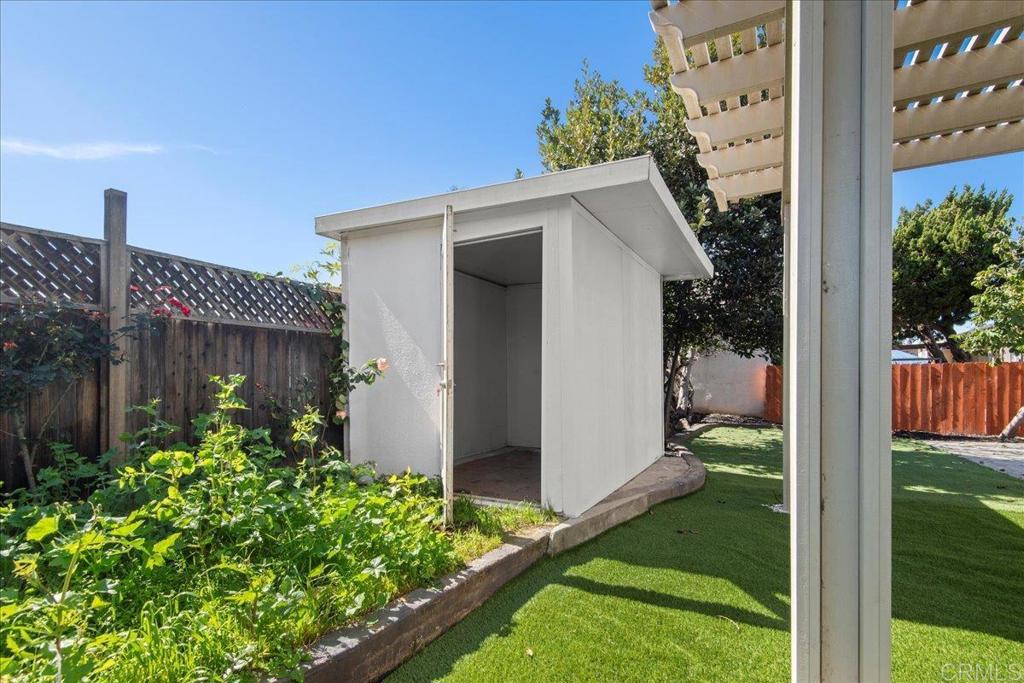 8739 St George Street Spring Valley, CA 91977 - Photo 13 of 30 a backyard of a house with lots of green space