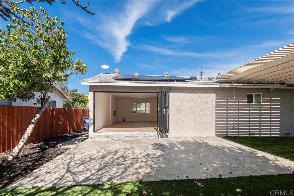 8739 St George Street Spring Valley, CA 91977 - Photo 15 of 30 a front view of a house with a yard