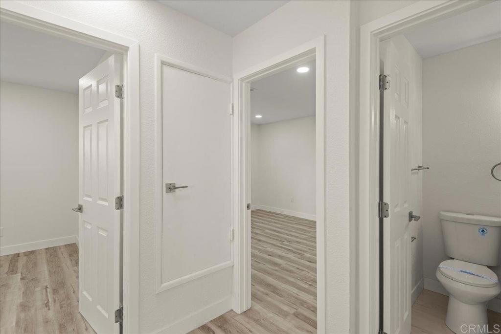 8739 St George Street Spring Valley, CA 91977 - Photo 17 of 30 a bathroom that has a toilet shower and a sink