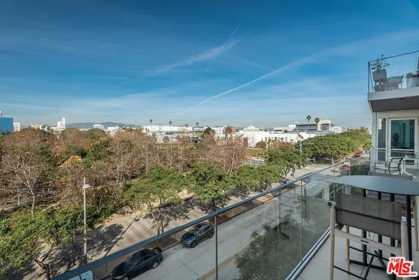 a view of a city from a balcony